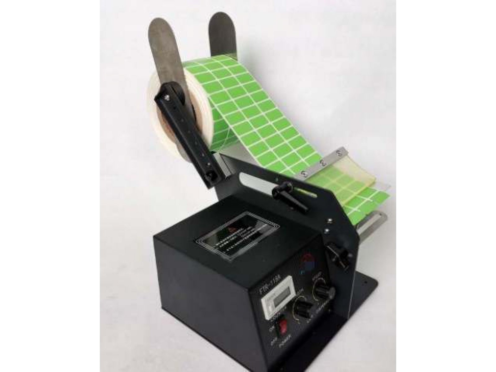 เครื่องลอกสติกเกอร์